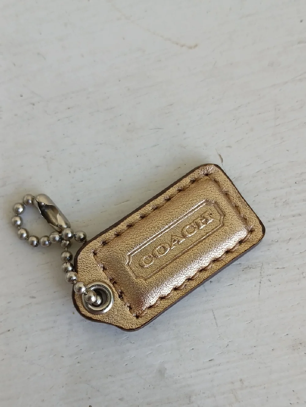 COACH Hang Tag Gold
